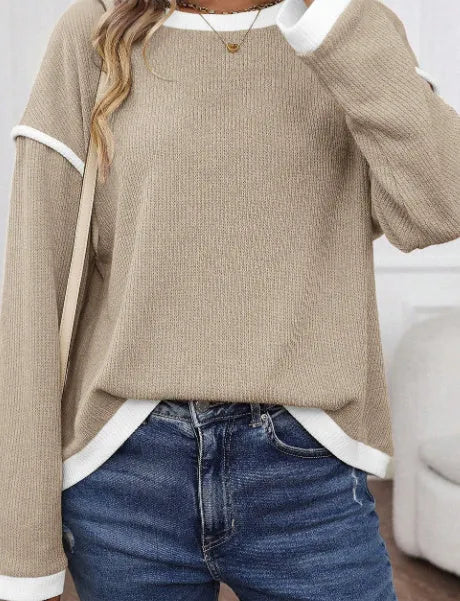 Drop shoulder loose knit top with four leaf clover contrast trim in polyester elastane fabric