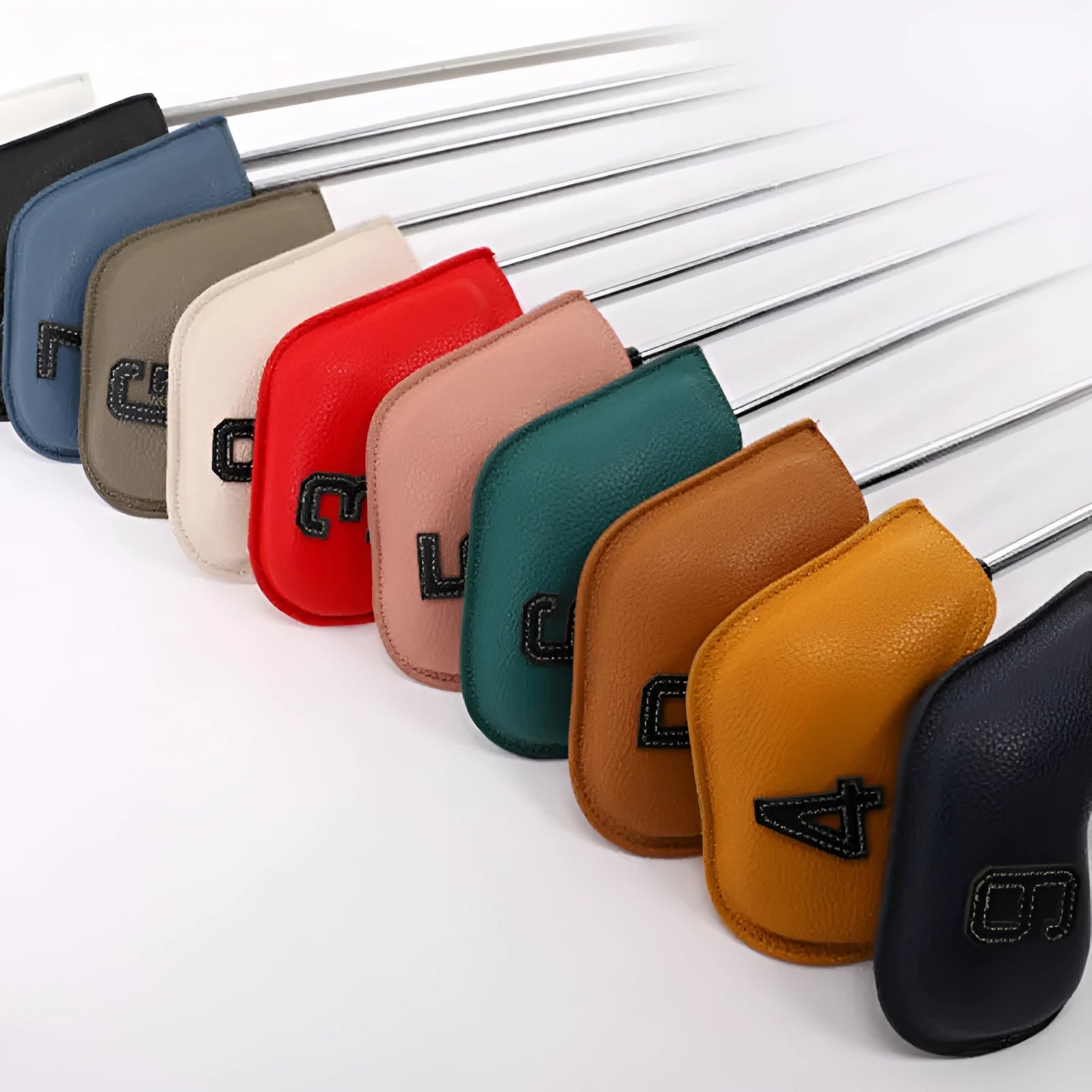 Set of ten colourful digitally printed golf club head covers made from PU material.