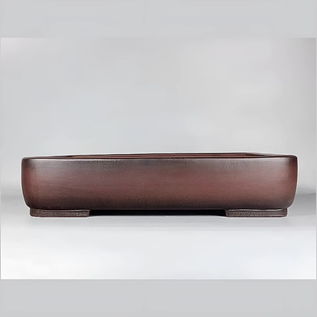 Handmade antique rectangular purple clay flower pot showing its size and natural colour.