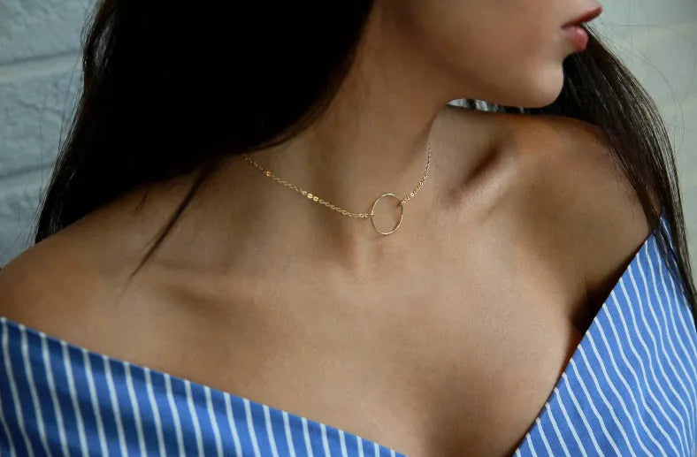 Alloy ring necklace with gold electroplated finish on single-layer chain, individually packed