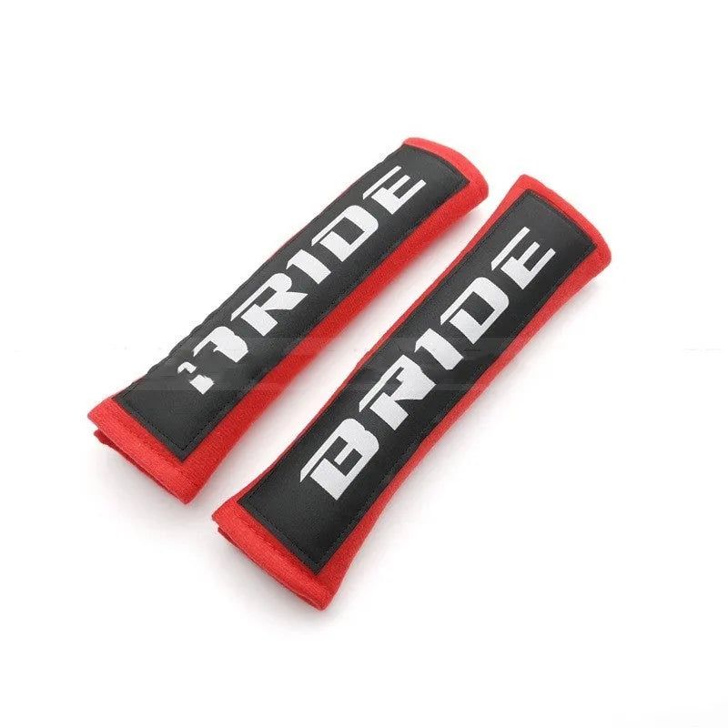 Car safety belt shoulder pad set in black, blue, or red colours, made from cotton sponge cloth.