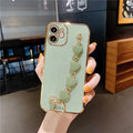 Green silicone phone case with a bracelet loop attached, compatible with Samsung and iPhone models.
