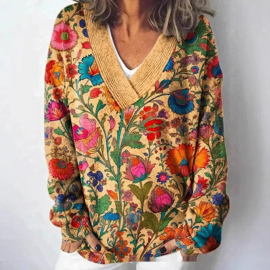 Women's V-neck long sleeve sweatshirt with a textured 3D floral print pattern in a retro style.