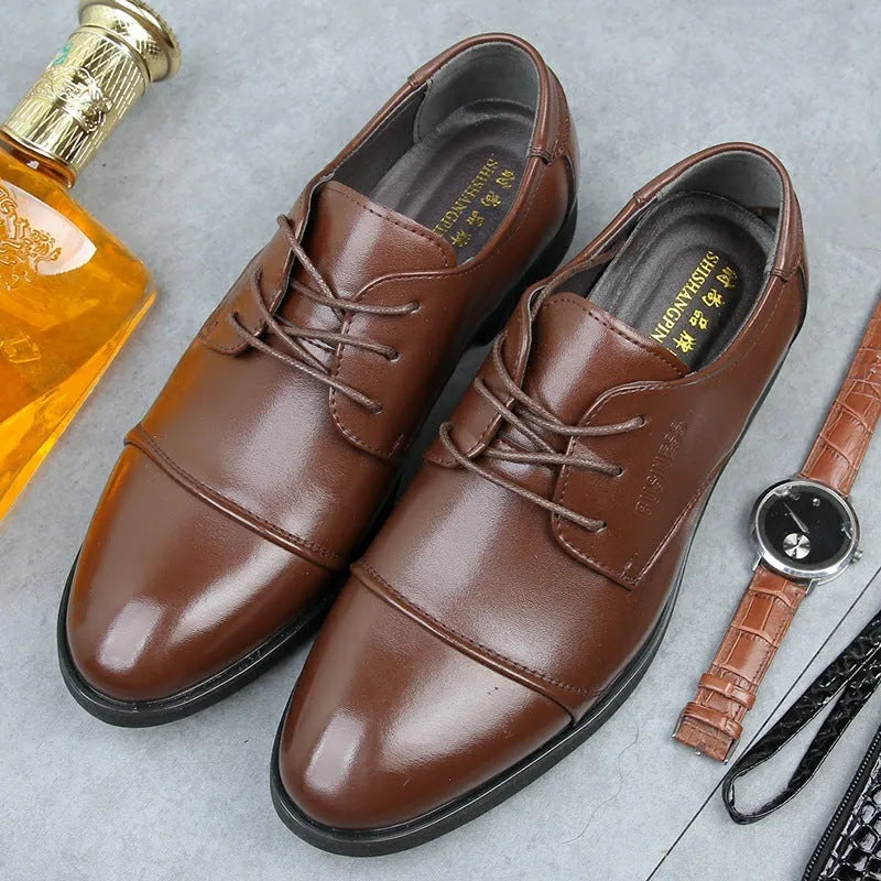 Men's black formal lace-up shoes with rubber sole and horse buckle detail