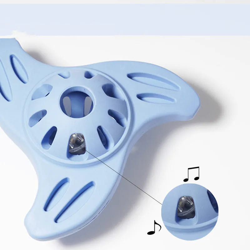 Blue or purple bite-resistant boomerang dog toy for medium and large breed chewing and fetch play.