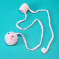 Cat toy with suction cup, spring, rabbit fur ball, and retractable elastic rope on a door