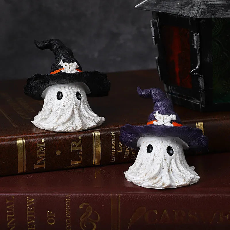 Resin wizard hat holiday ornament in purple and black colour options.