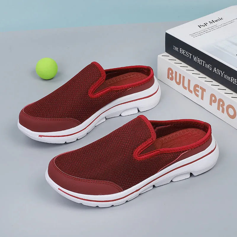 Breathable mesh toe holder slippers in solid colours on a flat heel sole.