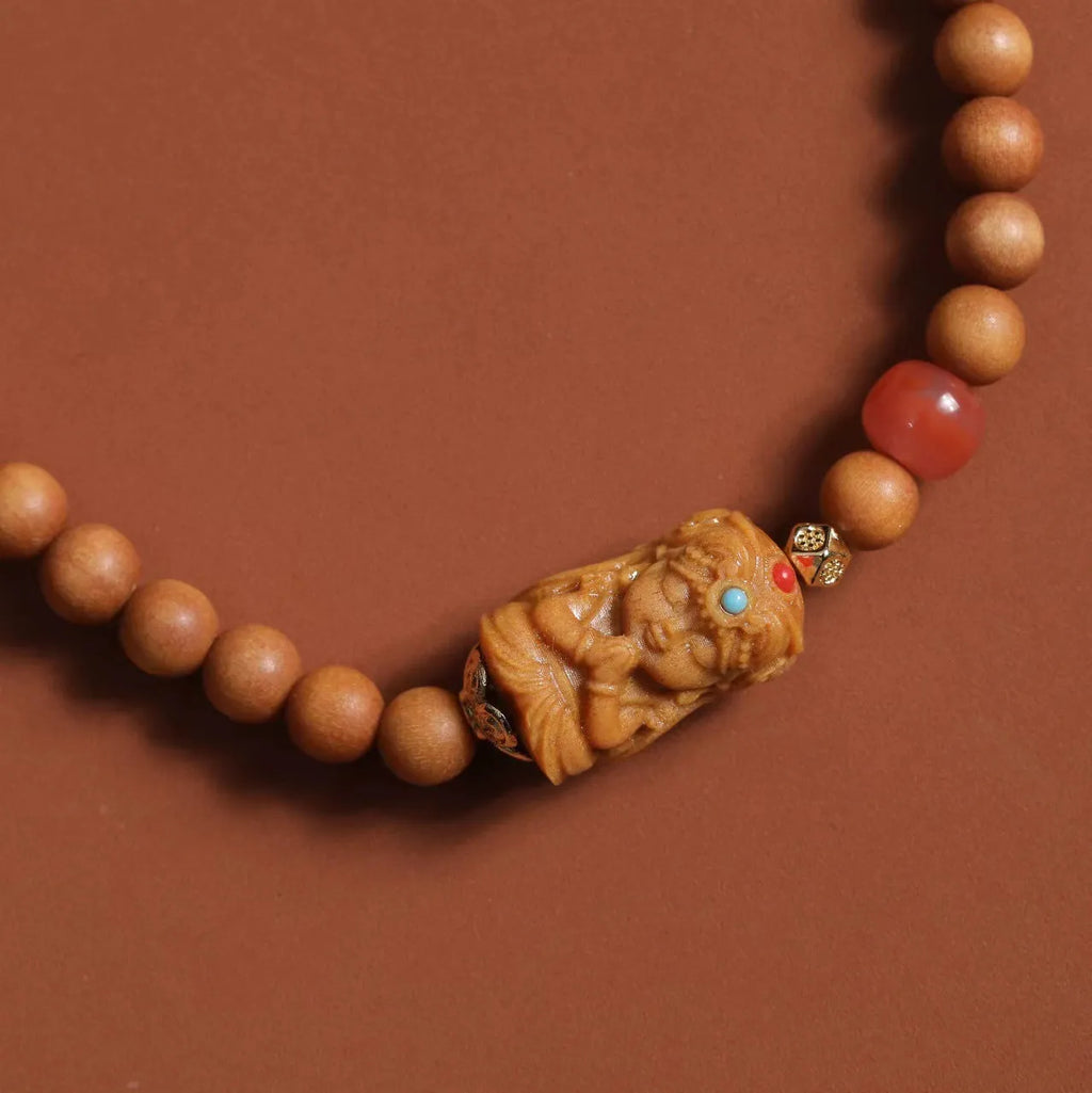 Brown wooden bracelet with South Red Zachilam double circle design showing 6mm round beads
