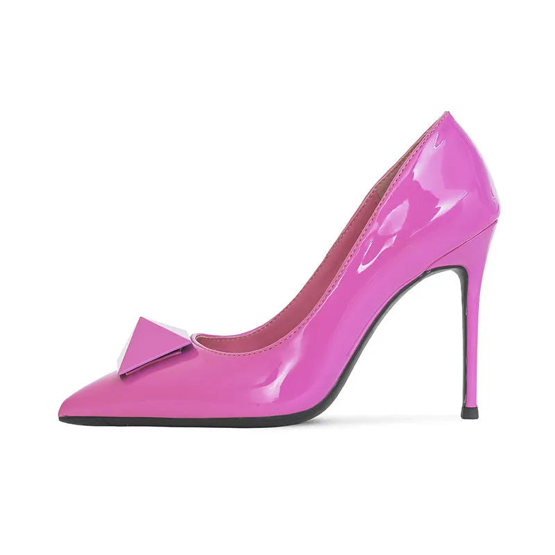 Pink patent leather women's stiletto heels with pointed toe, rivet detail, and an adjustable ankle buckle.