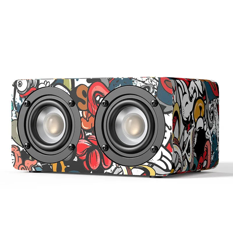 Mini Bluetooth speaker with wood shell, 8-inch dual speakers, graffiti colour, on a desk