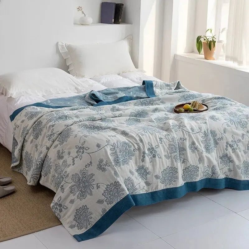 Pure cotton five-layer gauze bed sheet blanket in Roulette Wheel Blue pattern, shown flat.