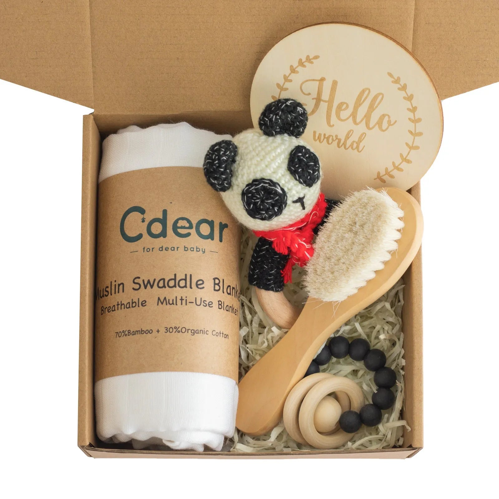 Baby teething toy gift set showing gauze blanket, wooden bell, gum teether, tire brush, and milestone on white background