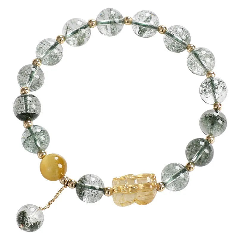 Green phantom quartz crystal bracelet with rutilated inclusions, geometric ethnic design, 8mm diameter