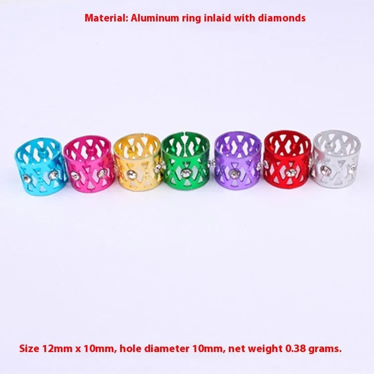 Aluminium hair ring with crown and heart decoration in seven colour options.