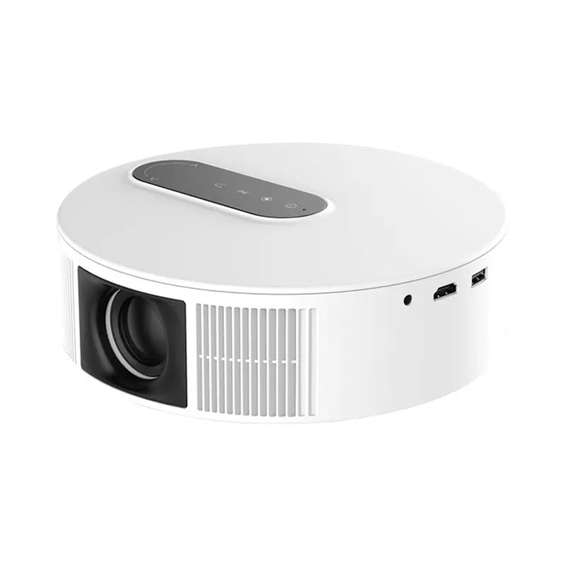White HD home cinema projector with remote control on a table