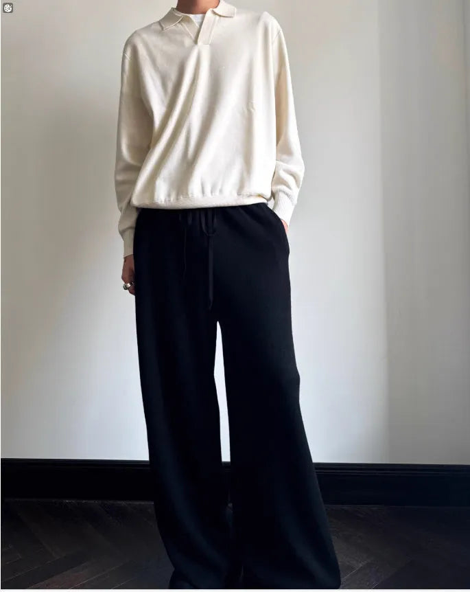 Man's pure wool polo sweater with a lapel collar in loose fit, shown in Milky White colour.