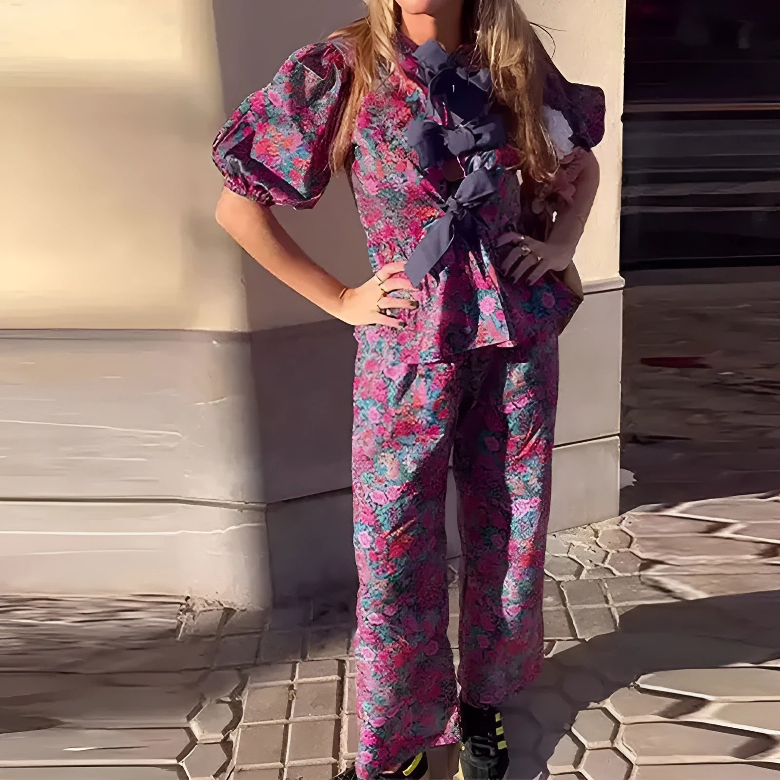 Women's floral print trousers suit with puff sleeves and tie-neck design in picture colour