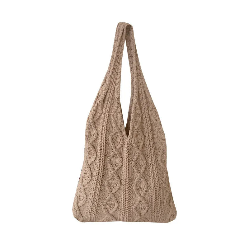 Retro crochet women's tote bag with double shoulder straps in a grass green colour, showing textured knit detail.