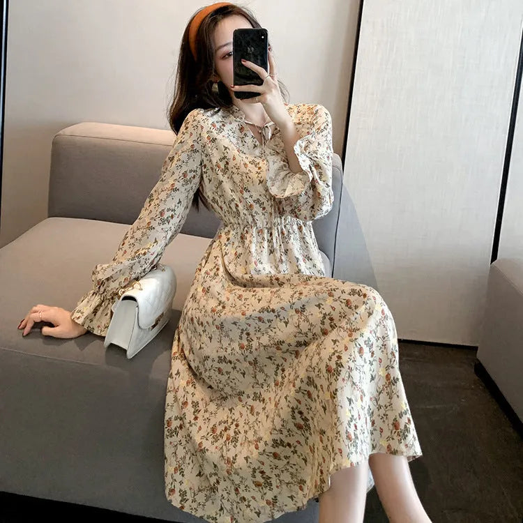 Retro waist-cinching A-line floral dress for women in apricot polyester fabric available in sizes S to 2XL