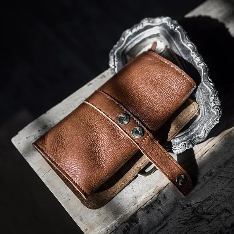 Handmade leather vintage wallet in black with tape extraction closure