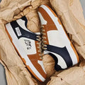 Men's simple lace-up casual sneakers in Rainbow, White Blue, and White Rice colour options.