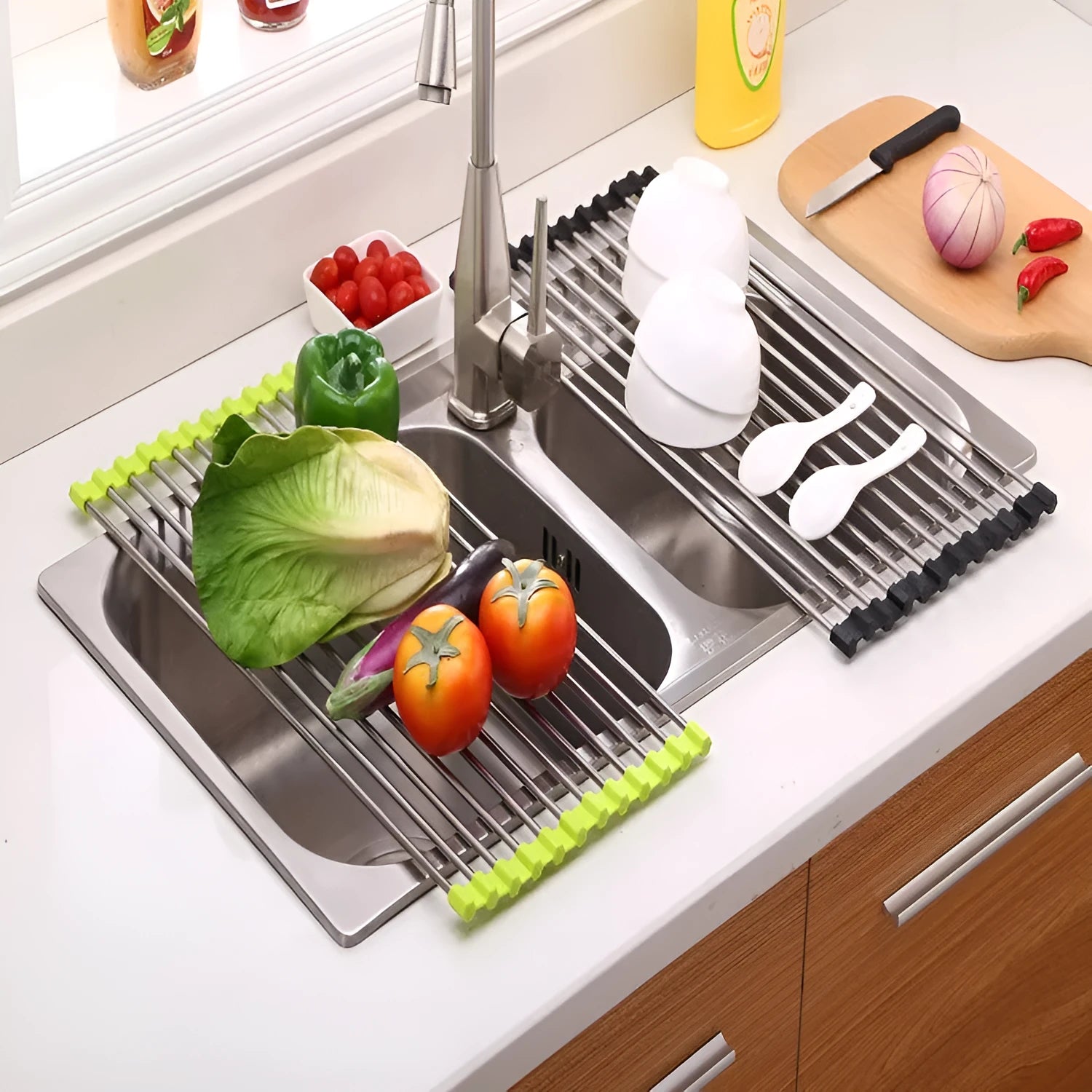 Folding stainless steel kitchen sink drying rack with multiple tubes, shown in a red finish.