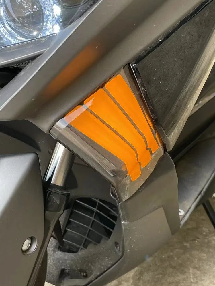 Pair of yellow LED cornering lamps for Tianying TS150 motorcycle retrofit installation.