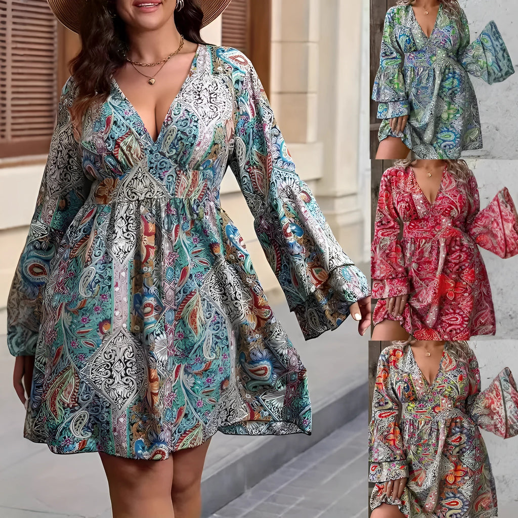 Plus size woman modelling a printed V-neck dress with long bell sleeves in a bohemian style.