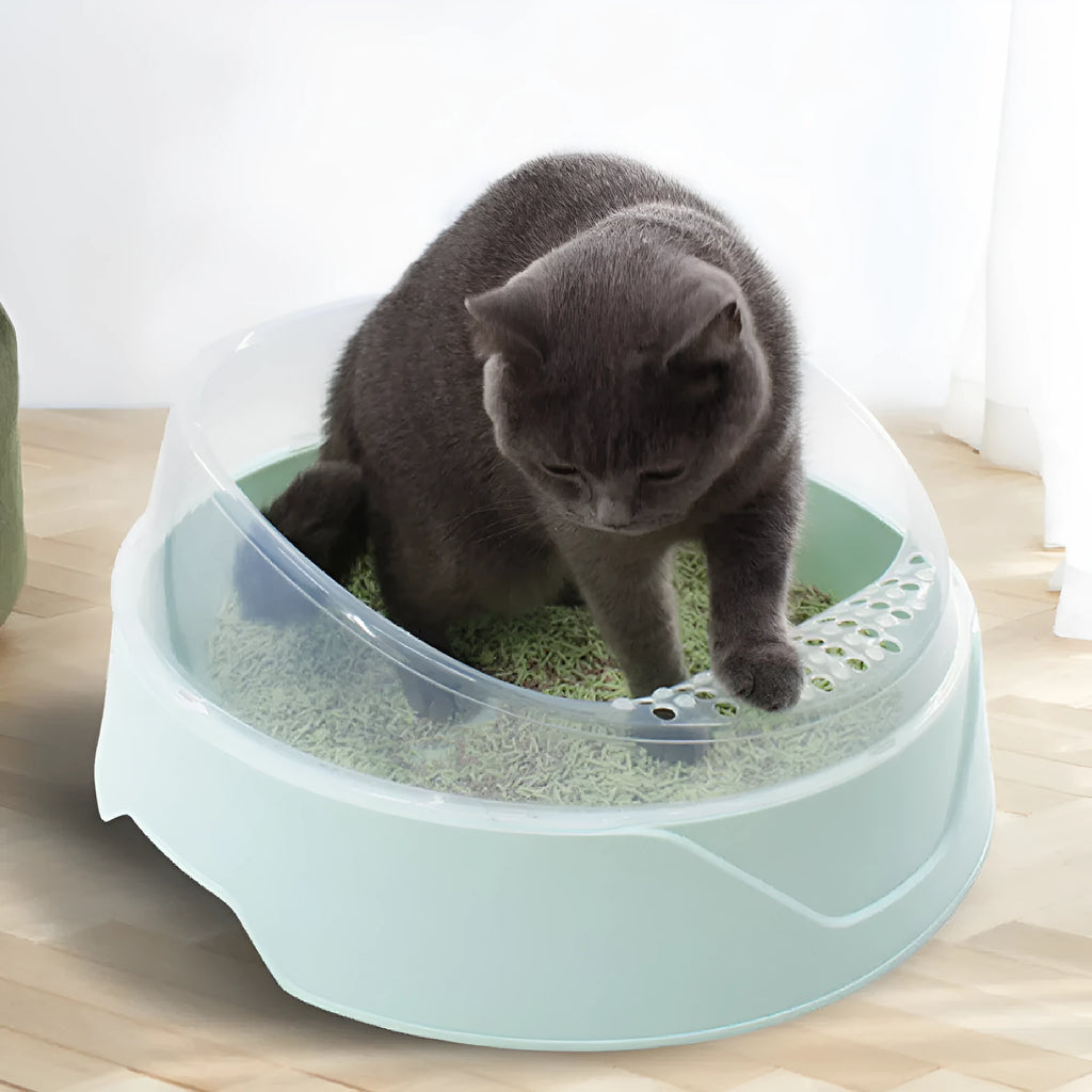 Round cat litter box in mint green colour, made from white PP plastic.