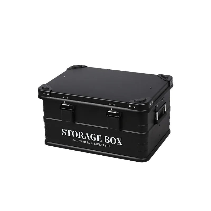 Army green waterproof plastic storage box sitting in a car boot