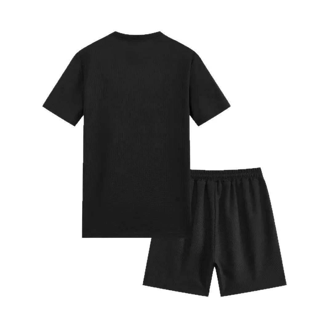 Man wearing a light apricot waffle texture short sleeve blouse and matching shorts for summer.