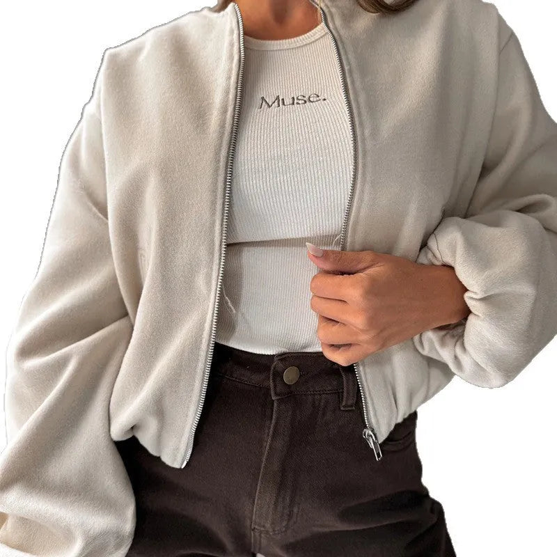 Women's off-shoulder short coat with lantern sleeves and round neck in brown.