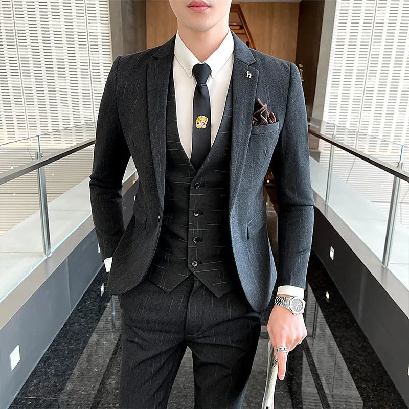 Men's slim fit British style business suit in black cotton blend fabric with adhesive interlining construction