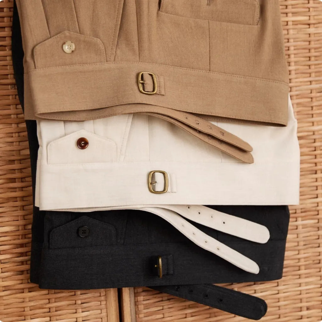 Men's slim fit straight leg business trousers in dark grey, displayed flat.