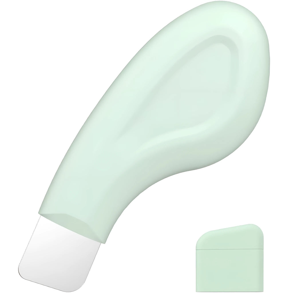 Stainless steel pore scraper face tool with a green silicone non-slip handle.
