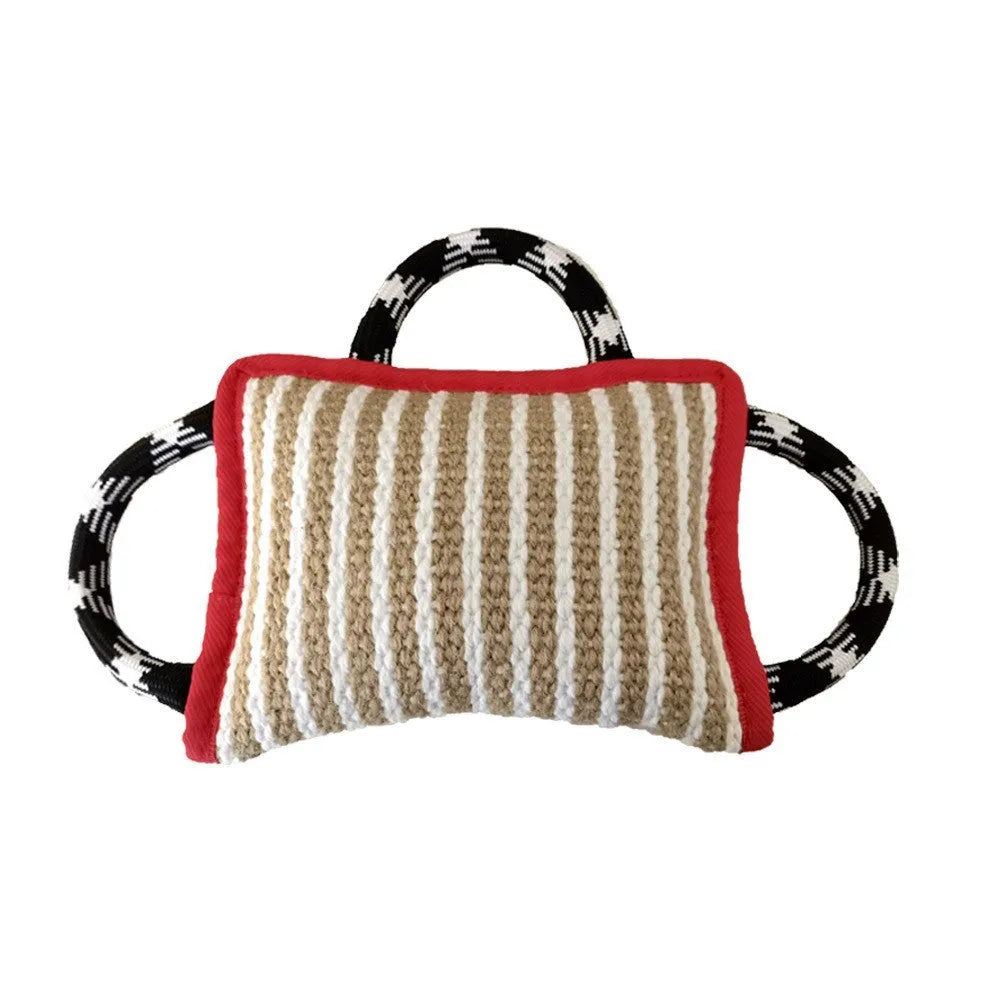 Jute dog tug toy with three rope handles and a central bite pillow for interactive play.