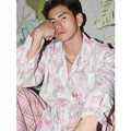 Floral long sleeve shirt with embossed pattern in blue and pink colours, loose fit for spring summer.