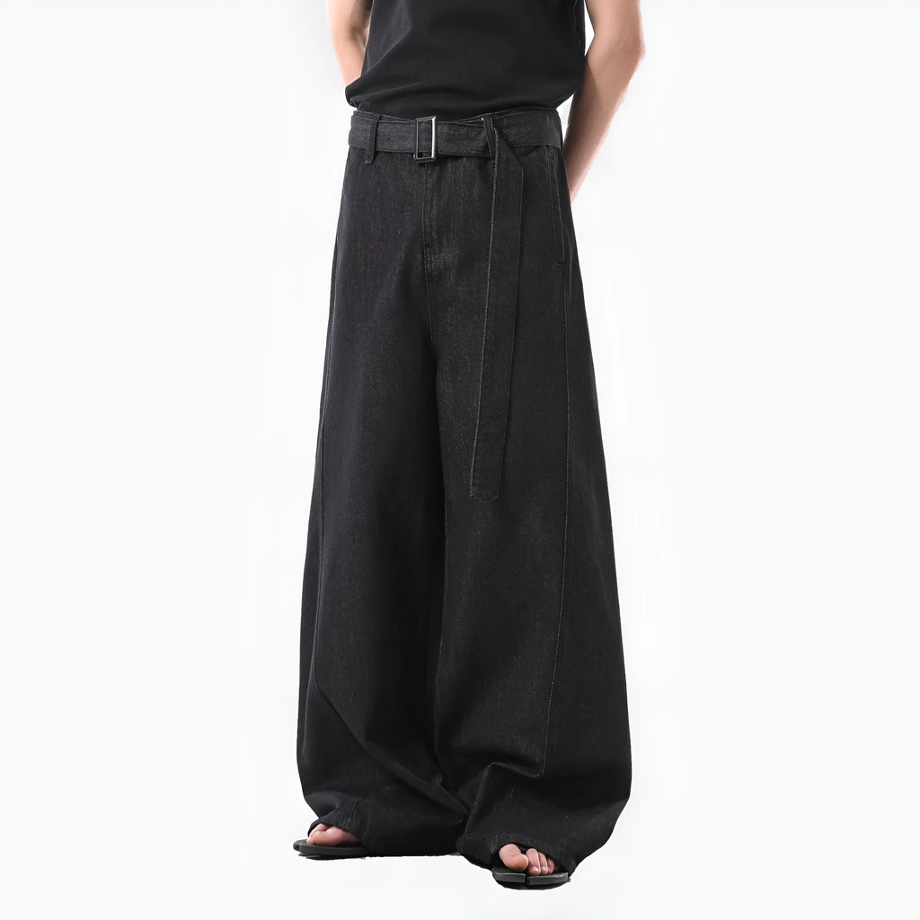 Women's black high-waist straight-leg jeans with retro gold wash detailing on denim.