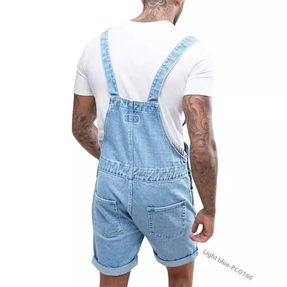 Men's black denim suspender trousers with straight legs and a zip fly on a hanger.