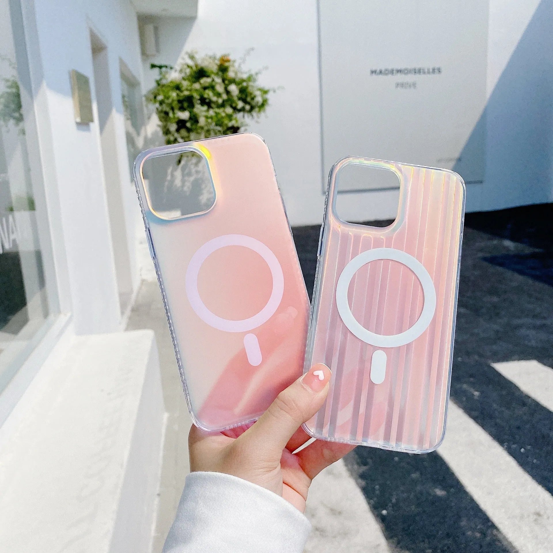 Transparent frosted magnetic back case for iPhone 14 Pro Max with visible camera cutout and shiny laser pattern