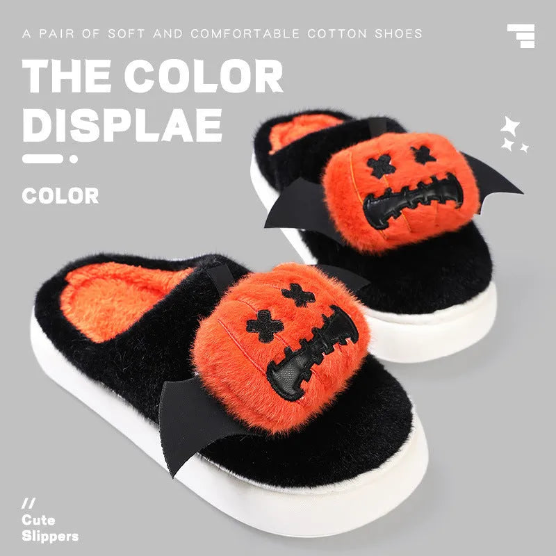 Black Halloween cartoon pumpkin slippers with small wings design on indoor floor