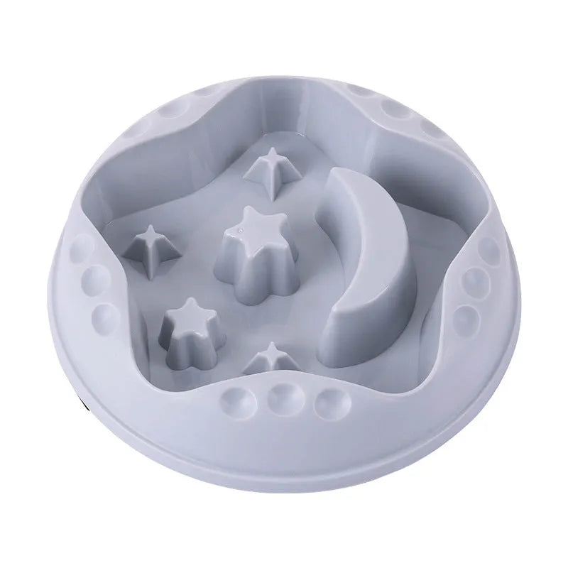 Moon star wings design slow feeder dog bowl in blue with non-slip base and internal ridges.