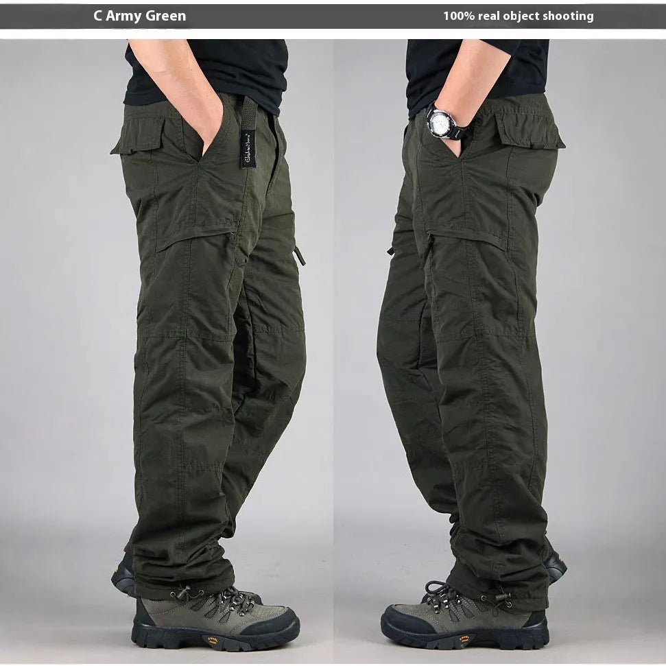 Men's thick khaki wool-lined cotton overalls with loose straight legs on a hanger