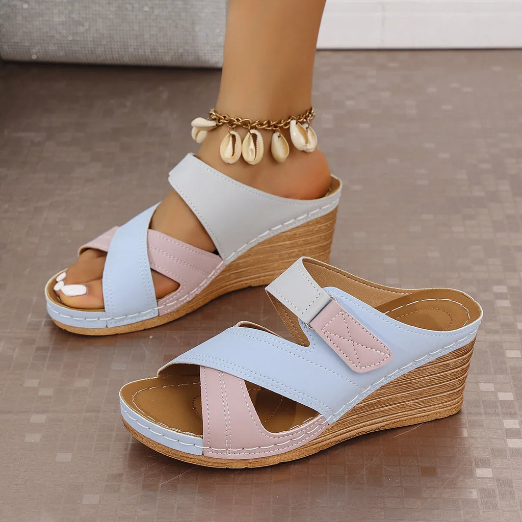Women's platform wedge slipper with Velcro strap in a two-tone colour, showing fish mouth toe design.