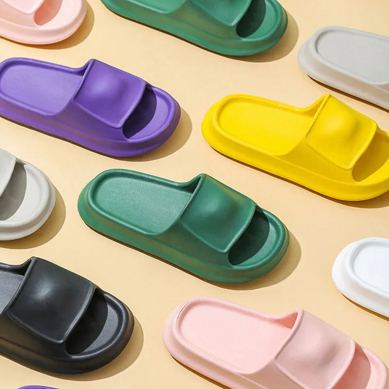 Soft EVA flip-flop slippers with a thick non-slip sole, shown in multiple colours on a white background.