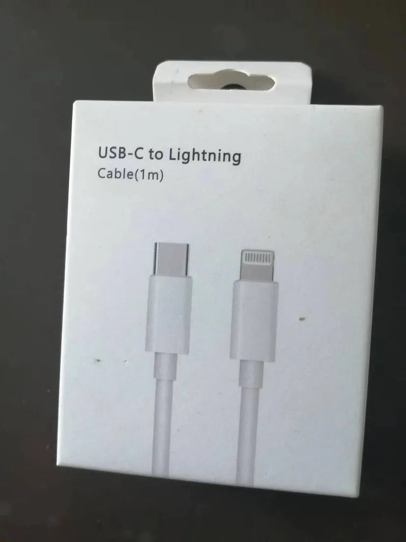 White 20W UK plug USB-C fast charger with a coiled Type-C charging cable.
