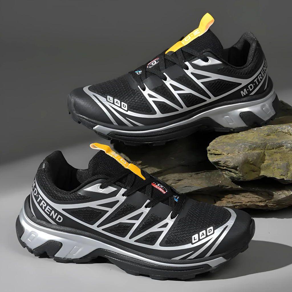 Men's and women's low-top outdoor hiking shoes in khaki with lace-up front and rubber sole.