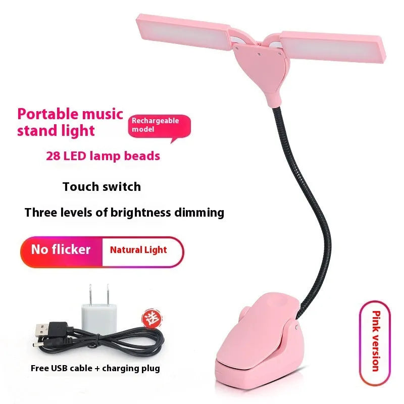 Rechargeable black music stand light with 28 LEDs placed on a music stand.