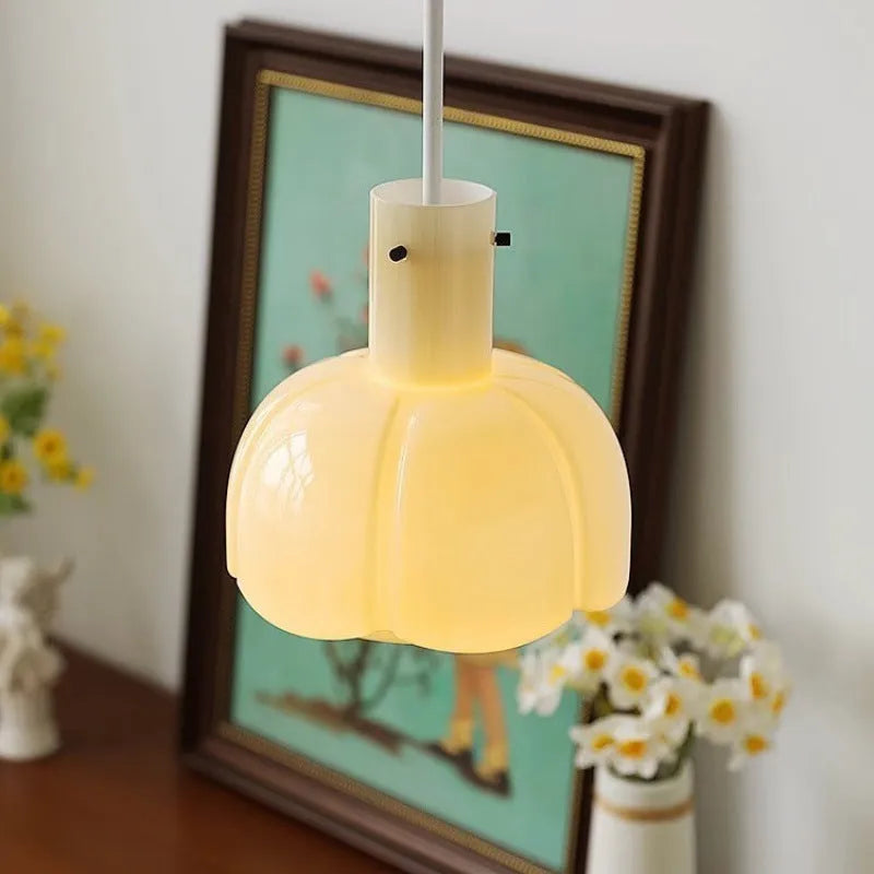 Medieval-style glass bud pendant chandelier light fitting in a retro design.